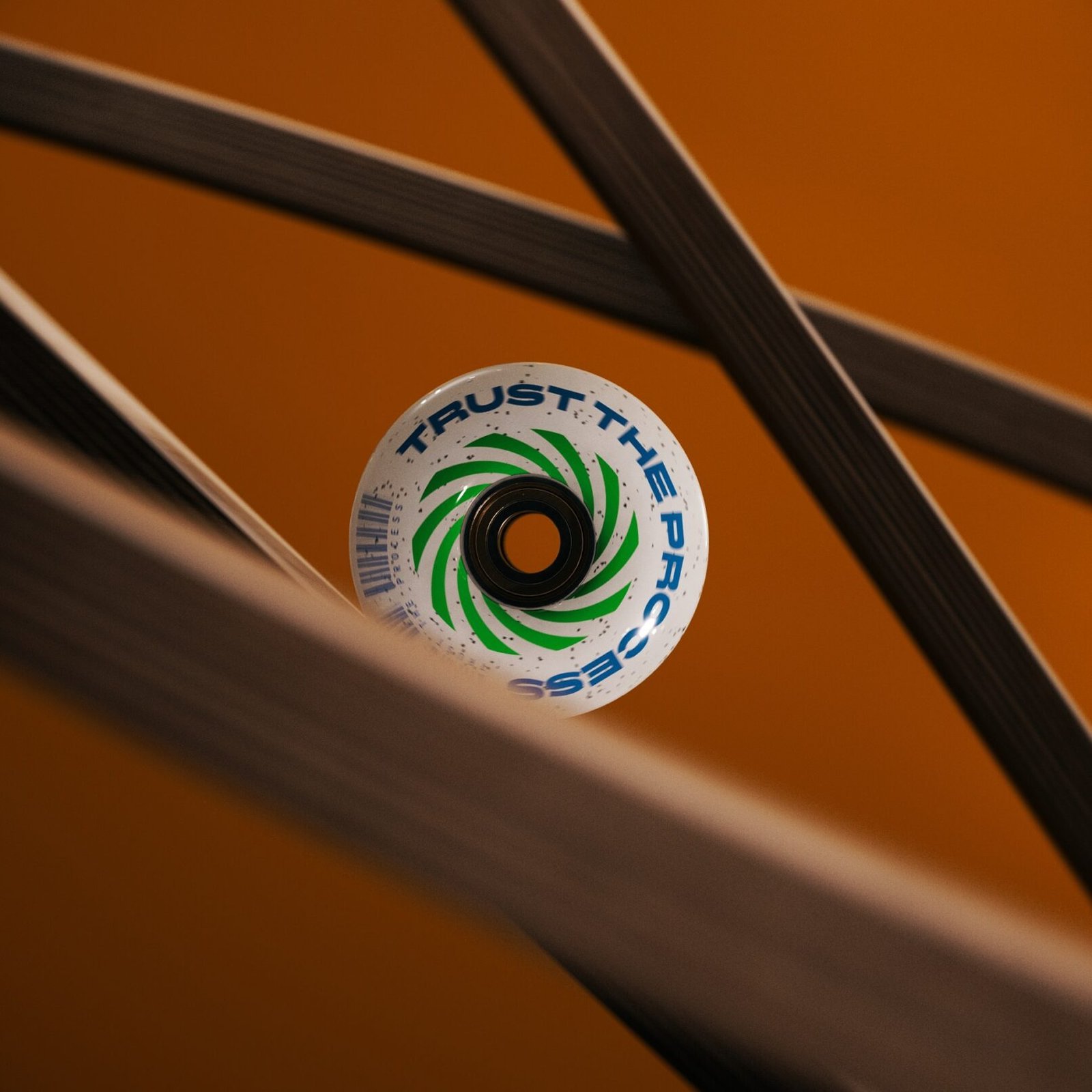 3D motion design wheel with 'Trust the process' text for SEO.